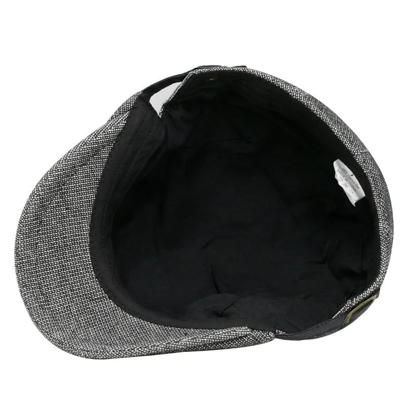 Men's adjustable cotton and linen beret in dome crown style on a neutral background
