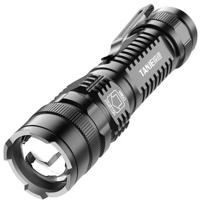 Black aluminium telescopic zoom LED flashlight with clip, shown zoomed in and out.