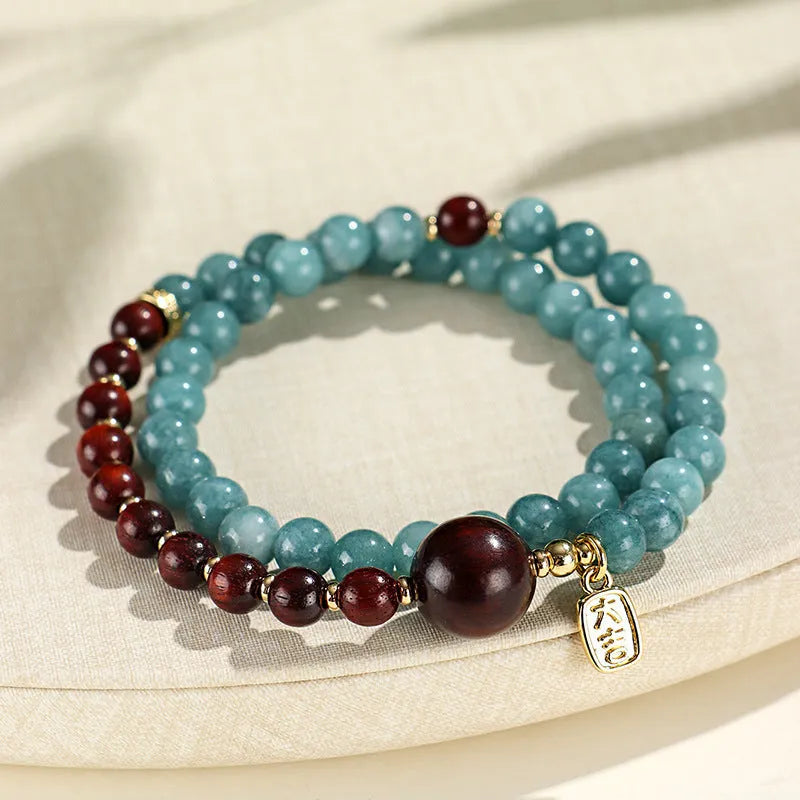 Women's blue gold sandalwood beaded bracelet with geometric design and Fu character, New Chinese style.