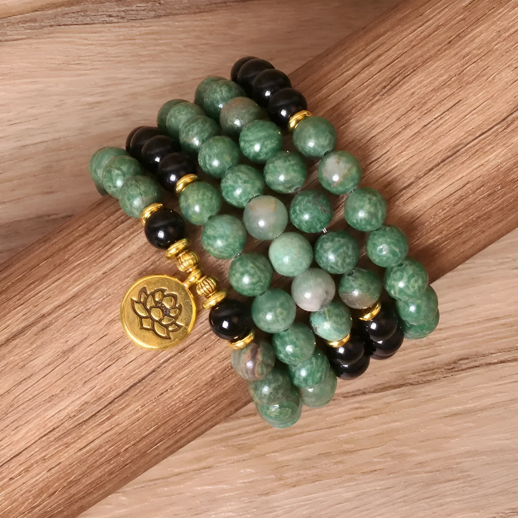 Green and black elastic beaded long bracelet with alloy beads on stretch cord
