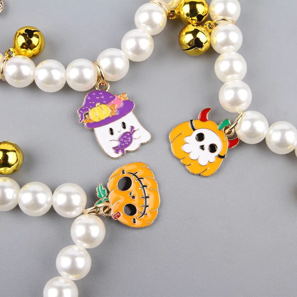 Halloween cat collar with simulated pearl beads and purple pumpkin charm decoration