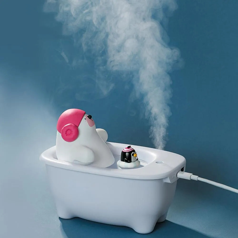 White USB air humidifier and aromatherapy diffuser with 550ml water tank on a desk