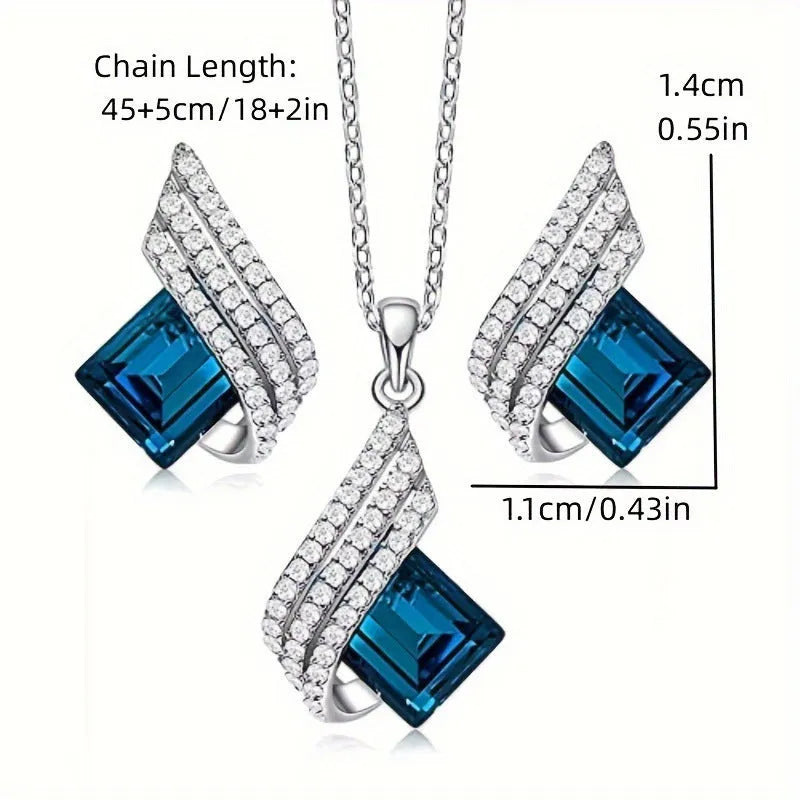 Fashion jewellery set showing alloy pendant necklace with cross chain and matching glass ear studs
