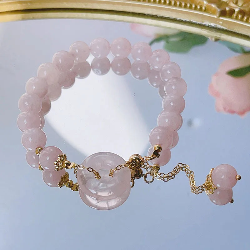 Pink crystal safety buckle bracelet with peace buckle design for women