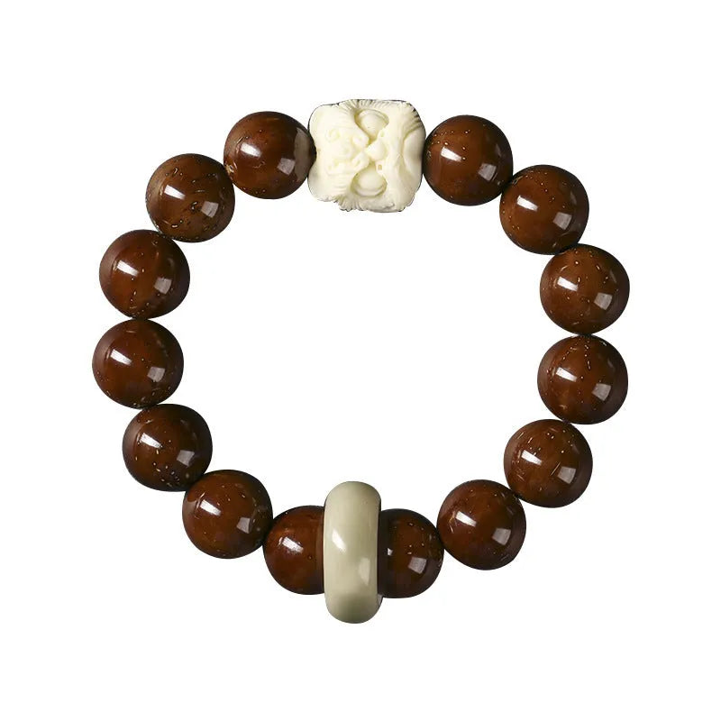 Hand-woven 13mm lion bead bracelet in ivory nut, sandalwood or yellow gradient bodhi style