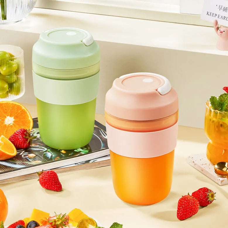 Grape purple portable rechargeable blender cup with lid, 400ml capacity, shown with USB cable.