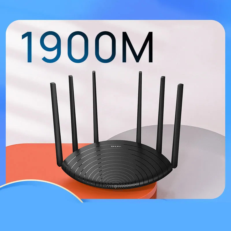 TL-WDR7661 AC1900 Gigabit Dual Band Wireless Router in black chassis on a desk.