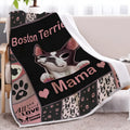 Pink Sherpa fleece dog themed throw blanket on sofa with hemmed edges