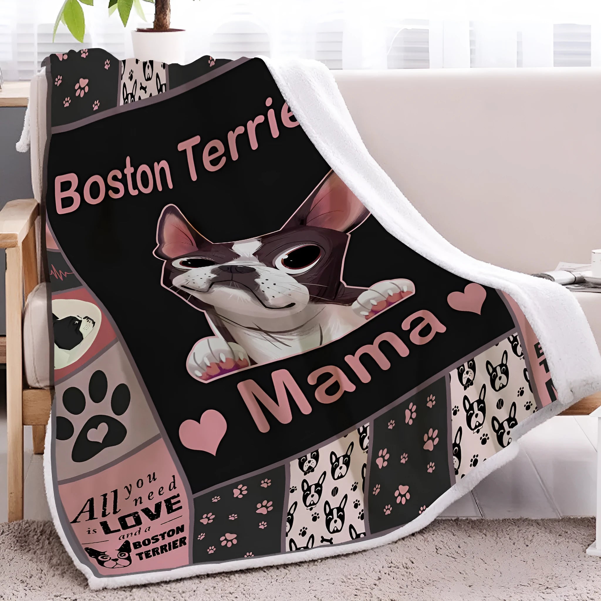 Pink Sherpa fleece dog themed throw blanket on sofa with hemmed edges