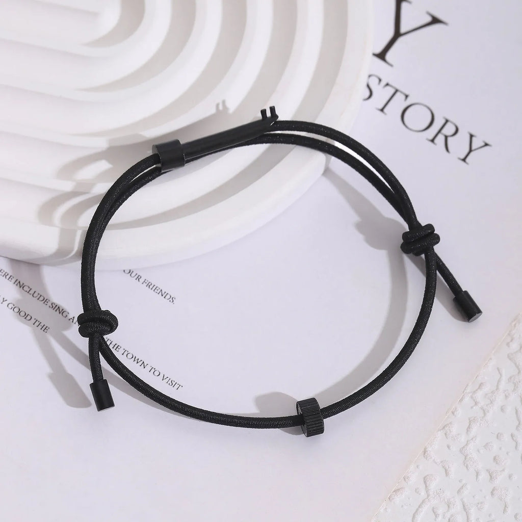 Tungsten carbide adjustable escape bracelet on wrist, geometric style, black finish