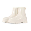 Women's low cut PVC rain boot in apricot colour with a non-slip sole.