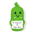 Green pickle-shaped squeaky dog chew toy with textured nubs on a white background.