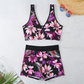 Women's two-piece printed boxer swimsuit set in polyester on a mannequin.