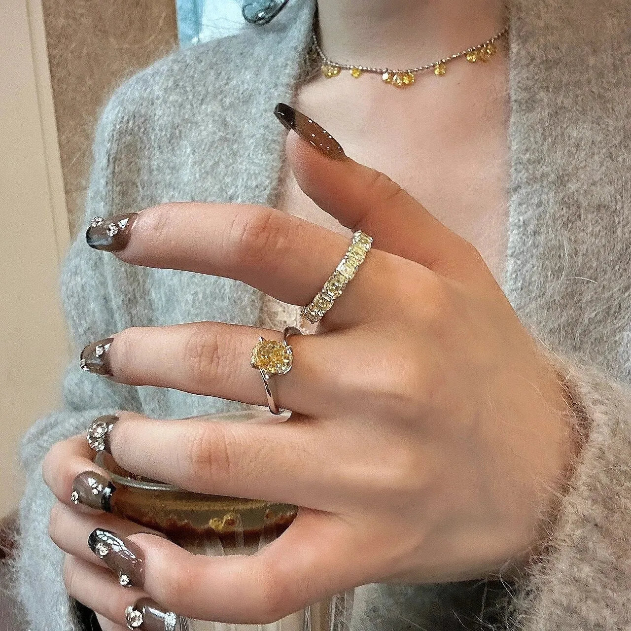 Women's yellow rock sugar crystal ring on copper with Seiko treatment showing colour and detailing