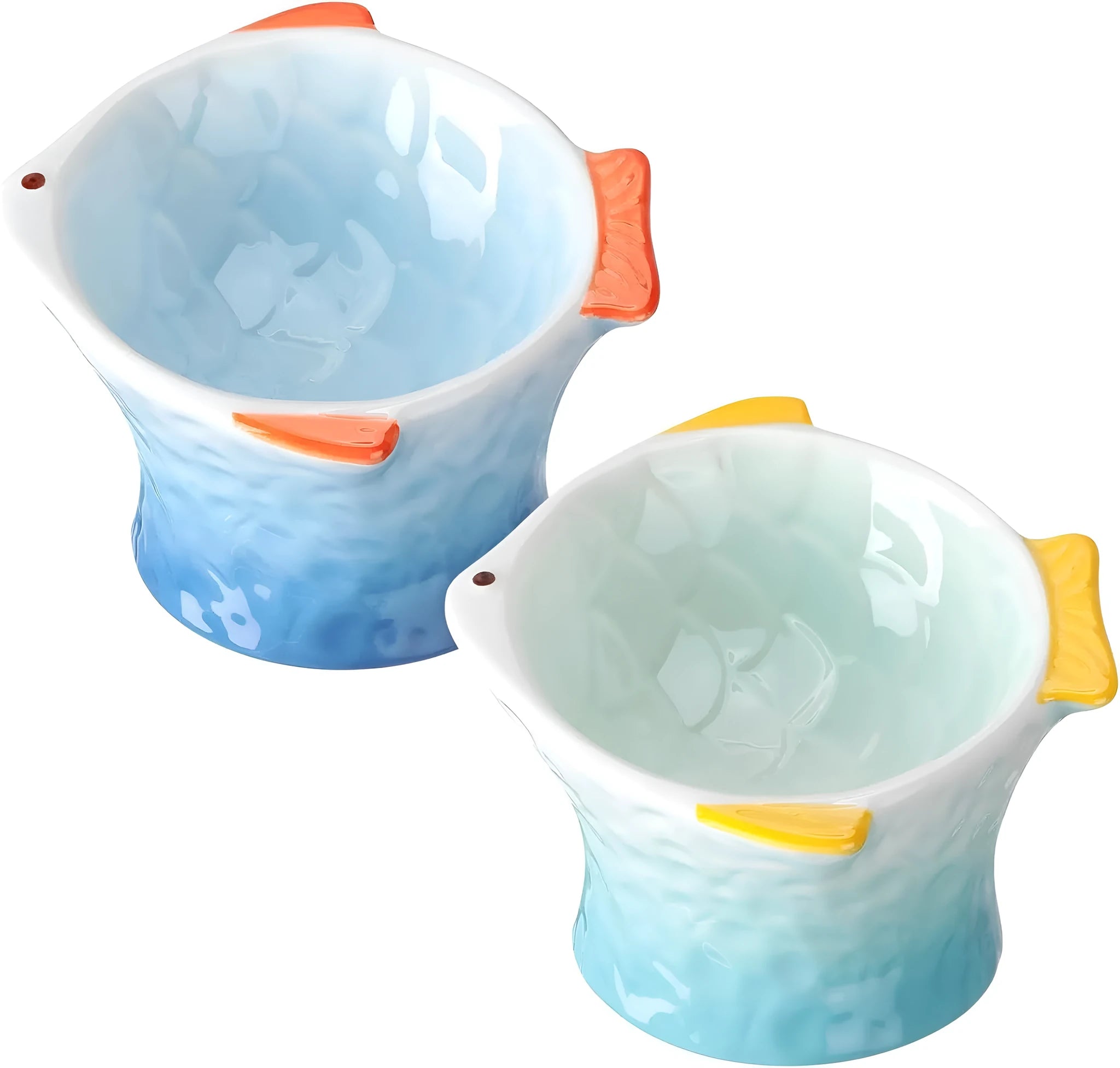 Set of four blue, fish-shaped ceramic cat bowls with a tilted design on a kitchen counter.
