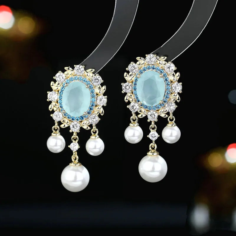 Oval geometric copper earrings with zircon inlay and pearl tassel in pink, blue, purple and white colours
