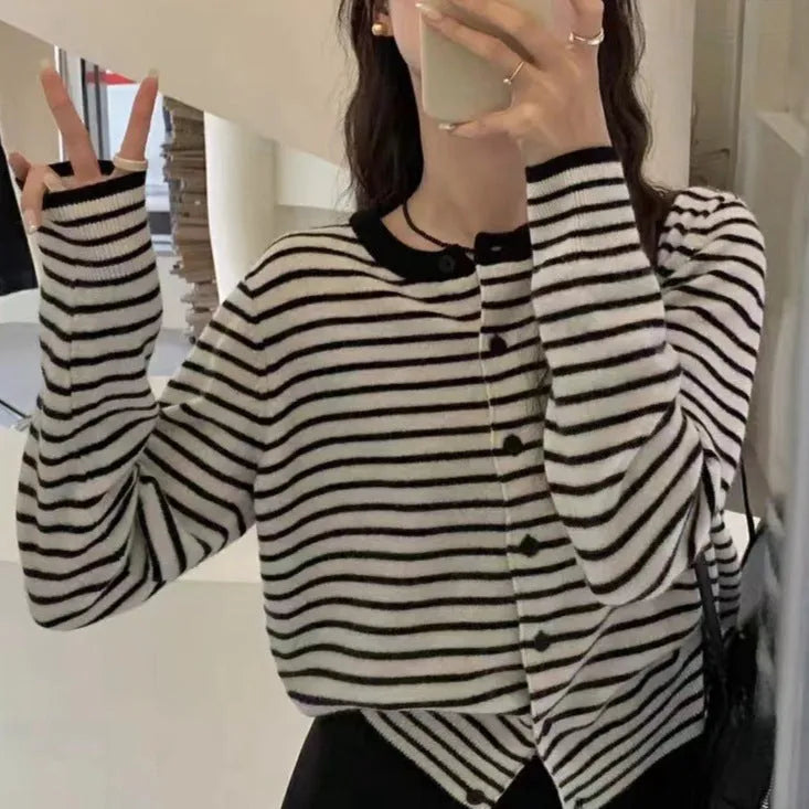 French style striped cardigan sweater coat with slim fit and short length on dark grey background