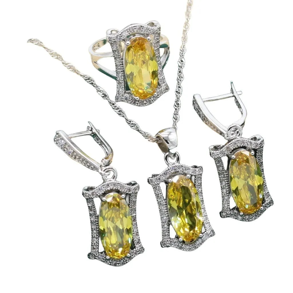 Women's anti-allergy zircon jewellery set in yellow with necklace, earrings, ring, and bracelet on display.