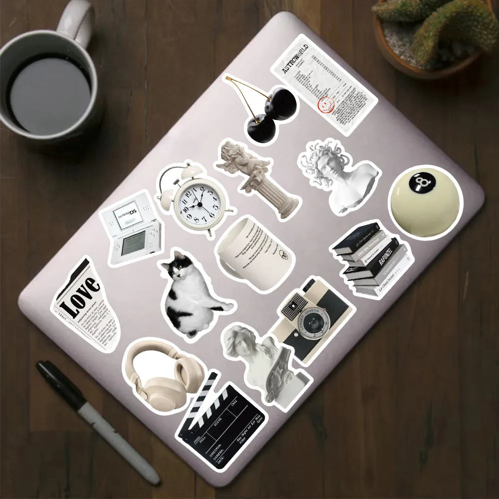 61-piece pack of black and white simple design waterproof PVC stickers for laptops and cups.