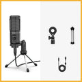 USB recording microphone with shock mount and tripod on a desk for computer or phone dubbing.