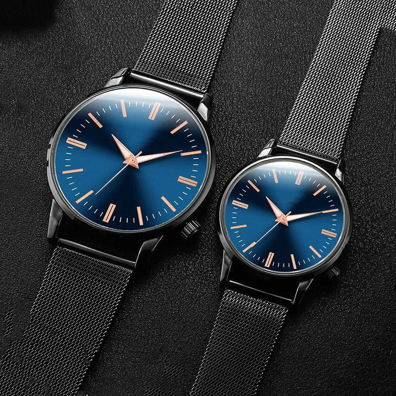 Luxury couple watch set with metal mesh band, blue dial, luminous display, and alloy case