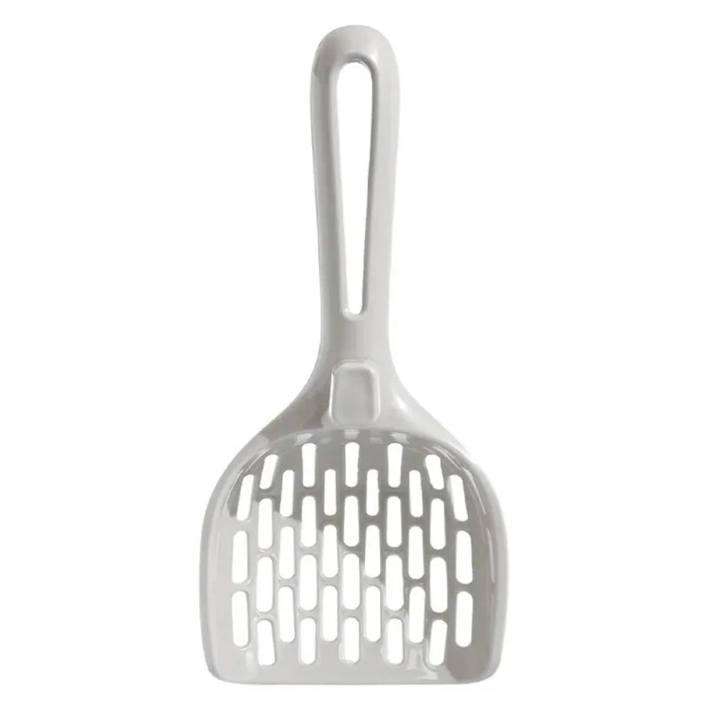 Grey plastic cat litter scoop with base stand showing drainage holes and ergonomic handle