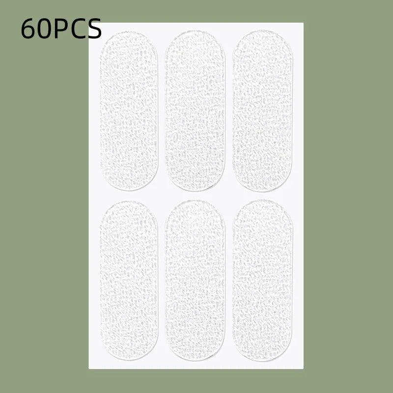 Transparent and frosted disposable ear patches showing adhesive backing and 0.1cm thickness