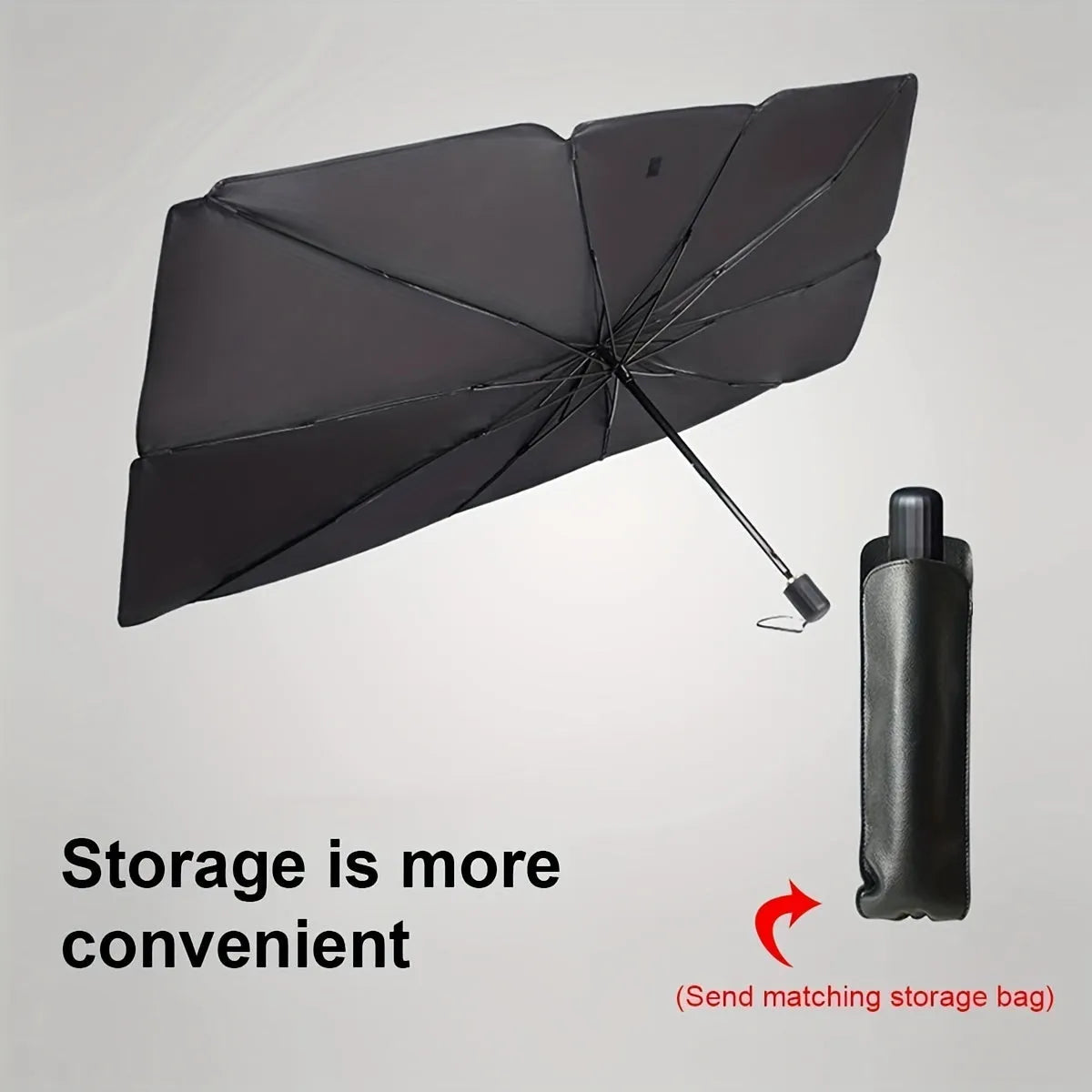 Open foldable car windshield sunshade umbrella placed against a car windscreen.