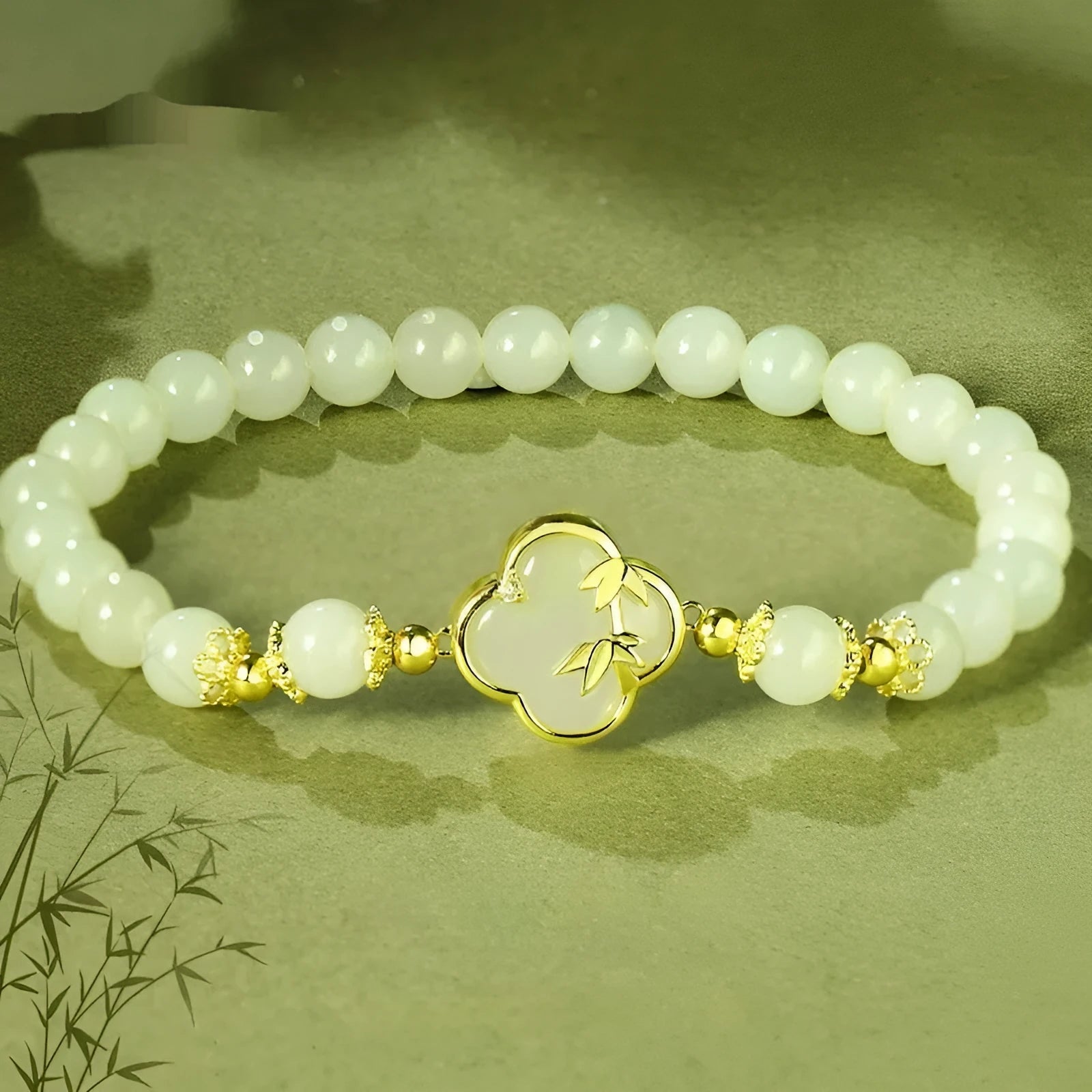 Hetian jade bracelet and necklace set with leaf design in bamboo green tone
