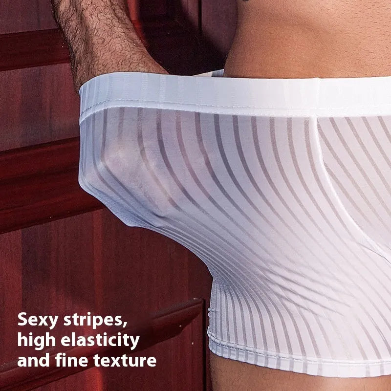 Men's black striped nylon boxer briefs laid flat, showing vertical pattern and elastic waistband.