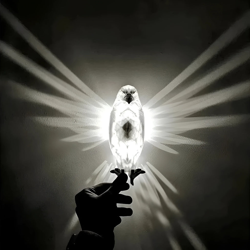 Eagle-shaped 3D projector wall lamp with resin plastic construction showing light projection effects
