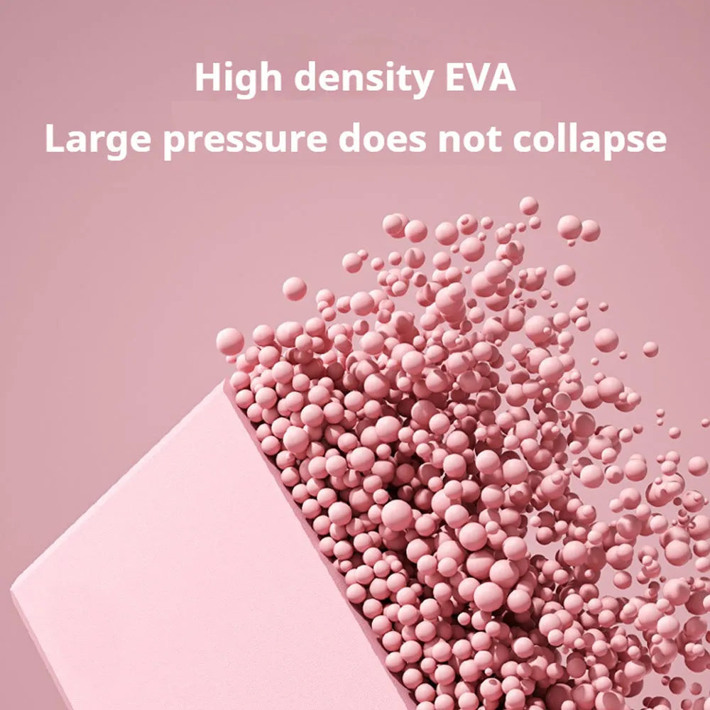 Solid colour high-density EVA yoga block on a gym floor.