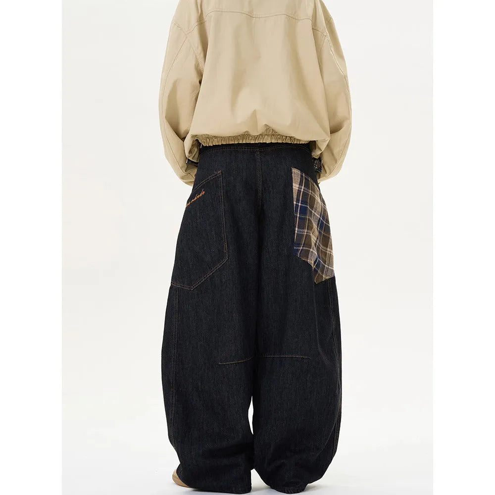 Loose straight-leg cotton trousers in coffee plaid and red plaid patterns showing mid-waist design