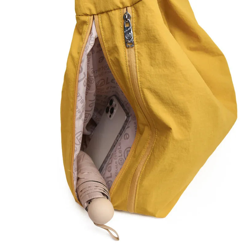 Heart-shaped nylon underarm bag for women in black, blue, khaki, or yellow with large capacity storage