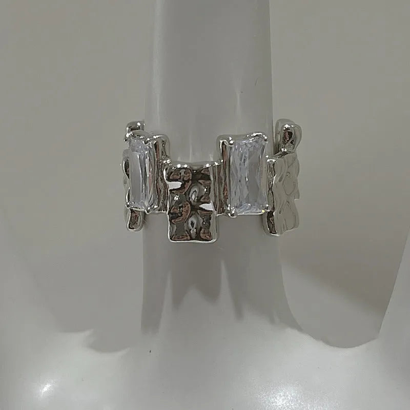 Geometric open design zircon ring in silver-plated metal with retro styling