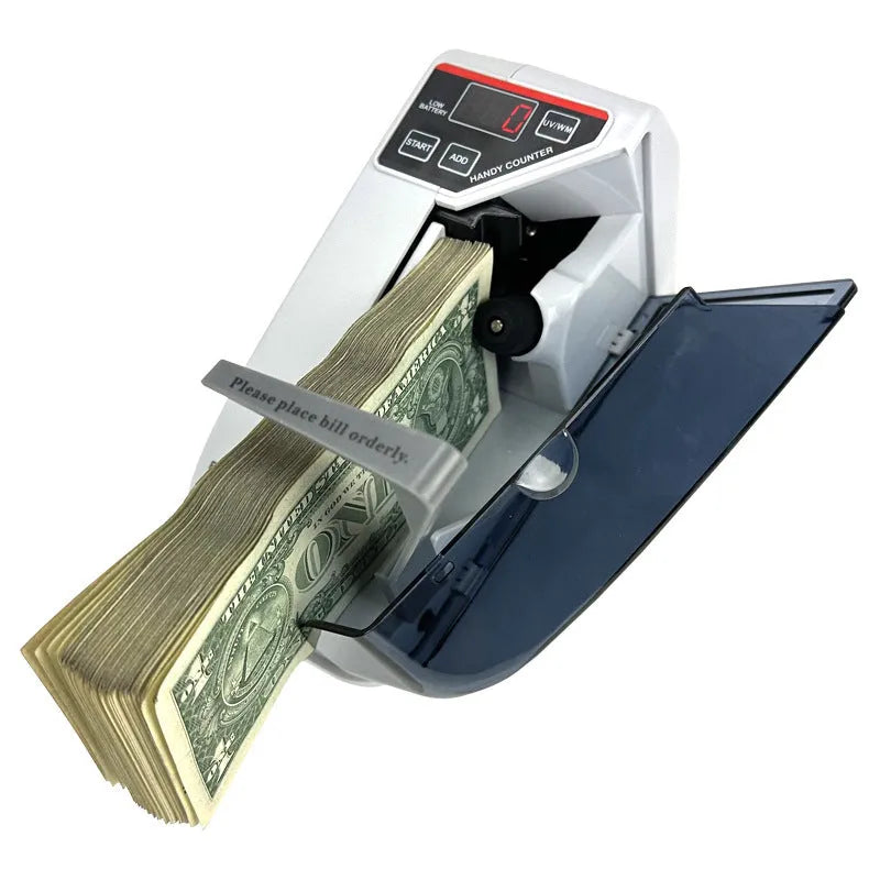 V31 foreign currency counting machine with purple light banknote verification and LED display on desk