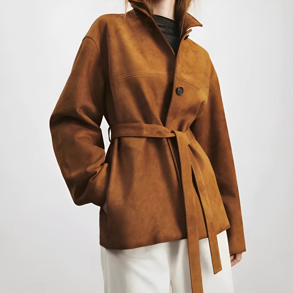 Yellow brown loose fit cashmere coat with a Peter Pan collar and a brown leather belt.