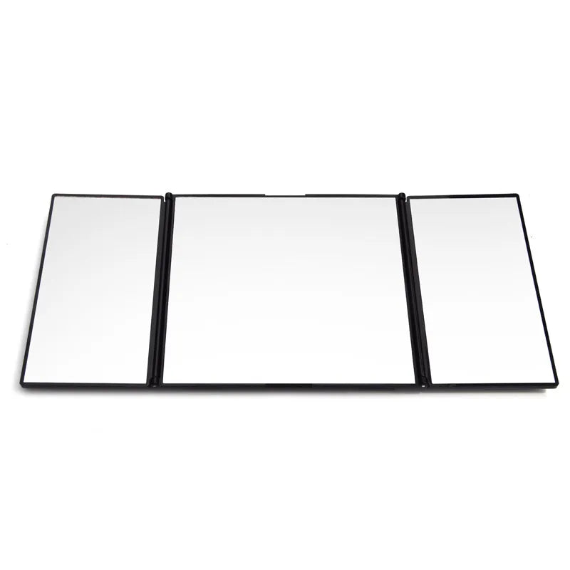 Silver car folding makeup mirror shown closed at 15.5 cm and opened at 30.5 cm wide.