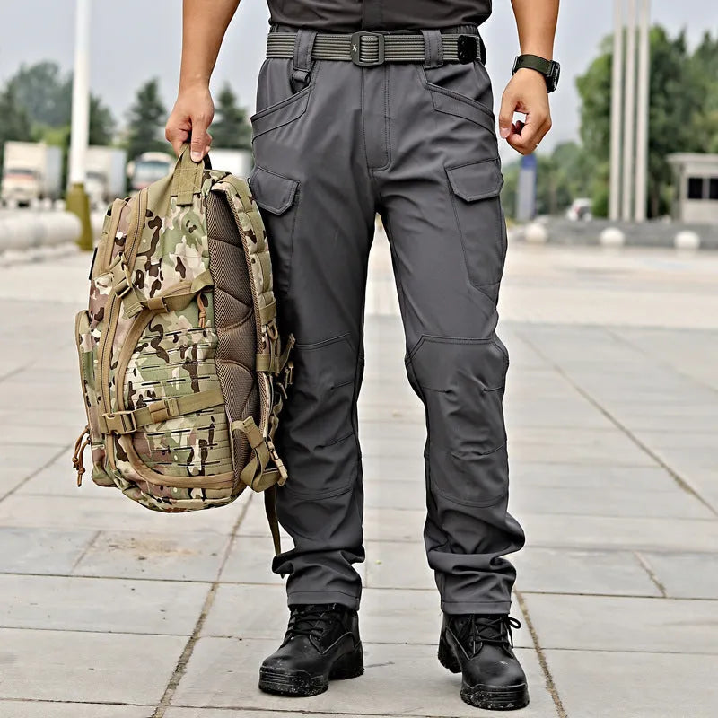 Men's camouflage stretch trousers in X9 khaki, loose fit, chemical fibre blend, outdoor wear