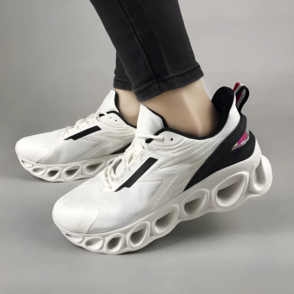 Men's breathable mesh sports shoes in black with white sole and lace-up front