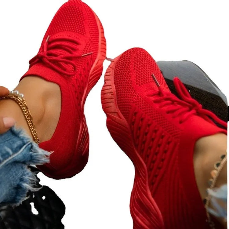 Women's thick-soled solid colour dad sneaker in multiple colour options on a white background.