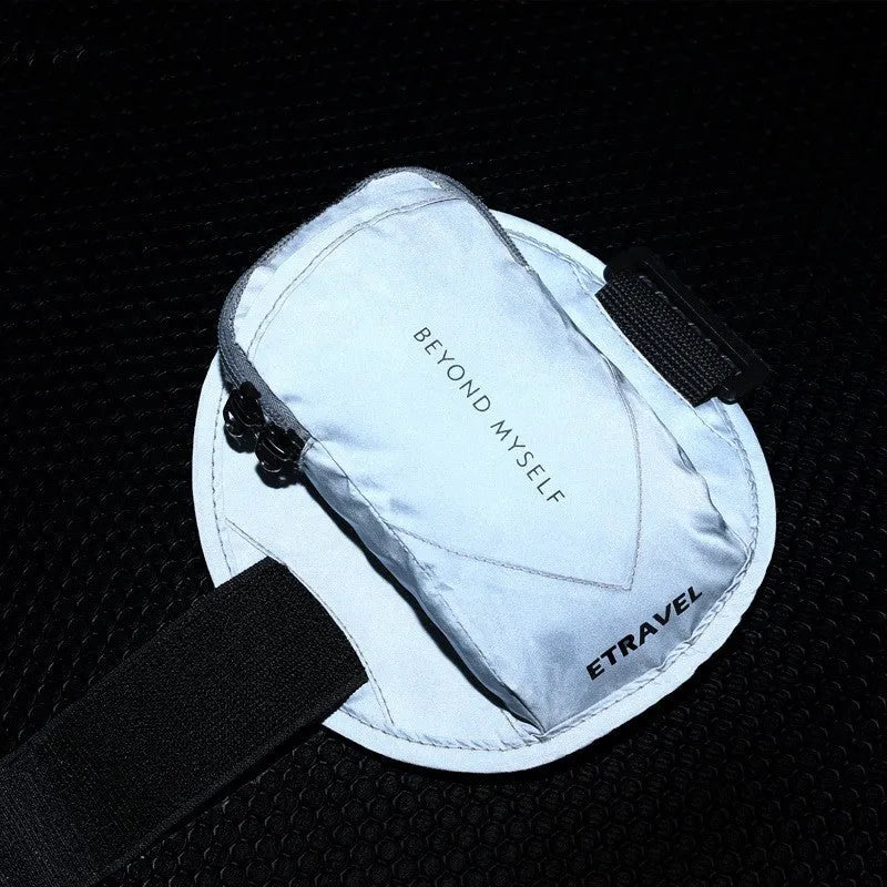 Lightweight reflective running arm bag with adjustable strap, shown in black colour.