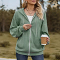 Green women's hooded sweatshirt coat with a full front zipper in a loose casual style.