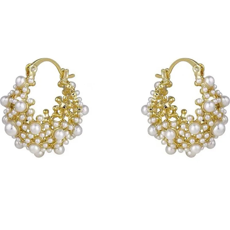 Gold floral basket earrings with pearl inlay detail on rice-shaped beads