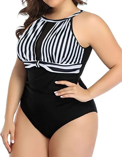 Women's black one-piece swimsuit with lace trim on mannequin, showing front and back.
