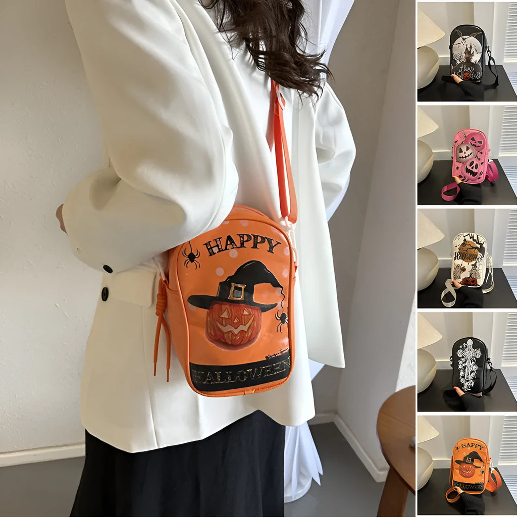 Black Halloween crossbody bag with cartoon pumpkin, ghost, and bat print, showing front and strap.