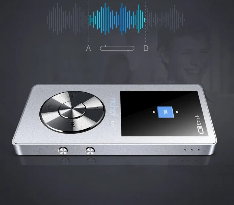 Gold coloured portable metal MP3 music player with screen and control buttons, shown next to headphones.
