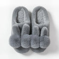Women's high-top rabbit fur winter slippers in various colours on a neutral background
