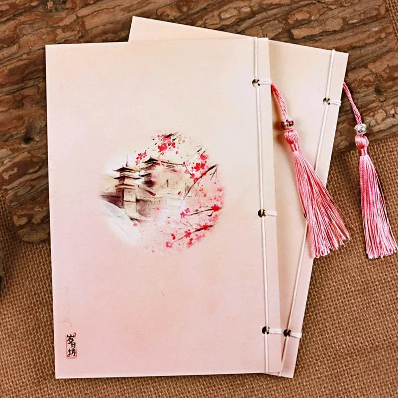 Traditional Chinese thread-bound notebook in Azalea watercolour design showing ancient binding and open flat pages