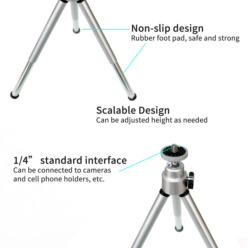 Black mini flexible tripod extended on a table with a silver U-shaped phone clip attached.